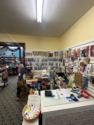 Shop counter with packaged supplies hanging on the walls
